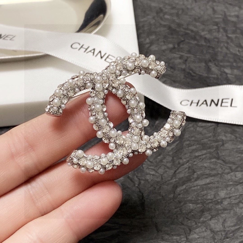 Ch*el brooches